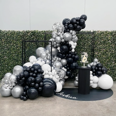Craft an ideal atmosphere for any special event with the 114pcs Black and Chrome Silver Balloon Garland, featuring a dynamic mix of black, white, and metallic silver balloons. This versatile set is perfect for elevating occasions such as Birthdays, Valentine's Day, Summer parties, Graduation, Weddings, Bridal showers, Baby showers, Anniversaries, and more.